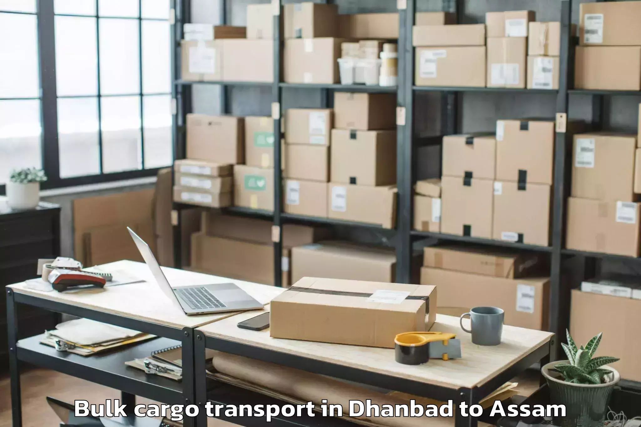 Book Dhanbad to Soalkuchi Bulk Cargo Transport